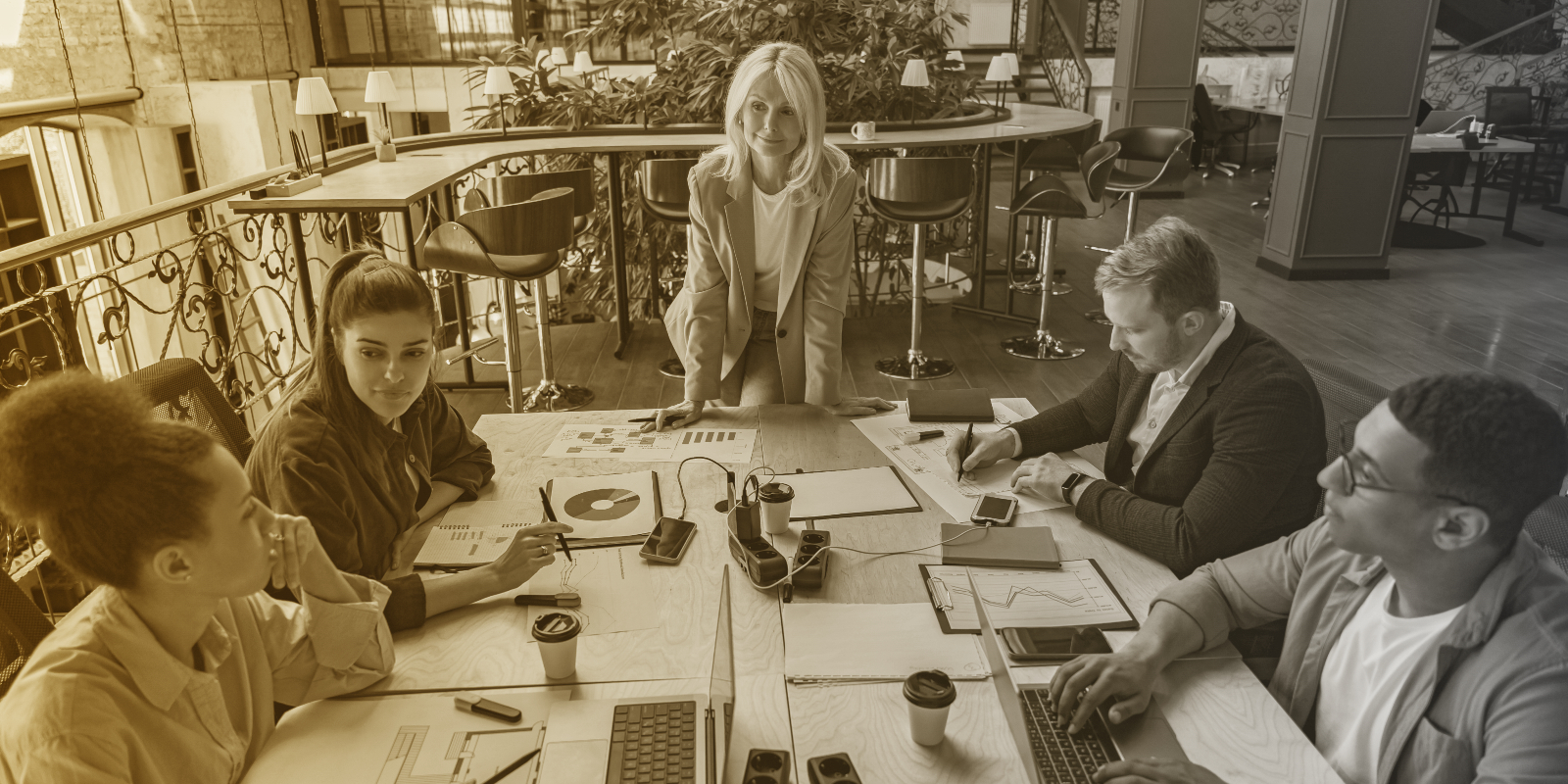 Marketing team meets around a table
