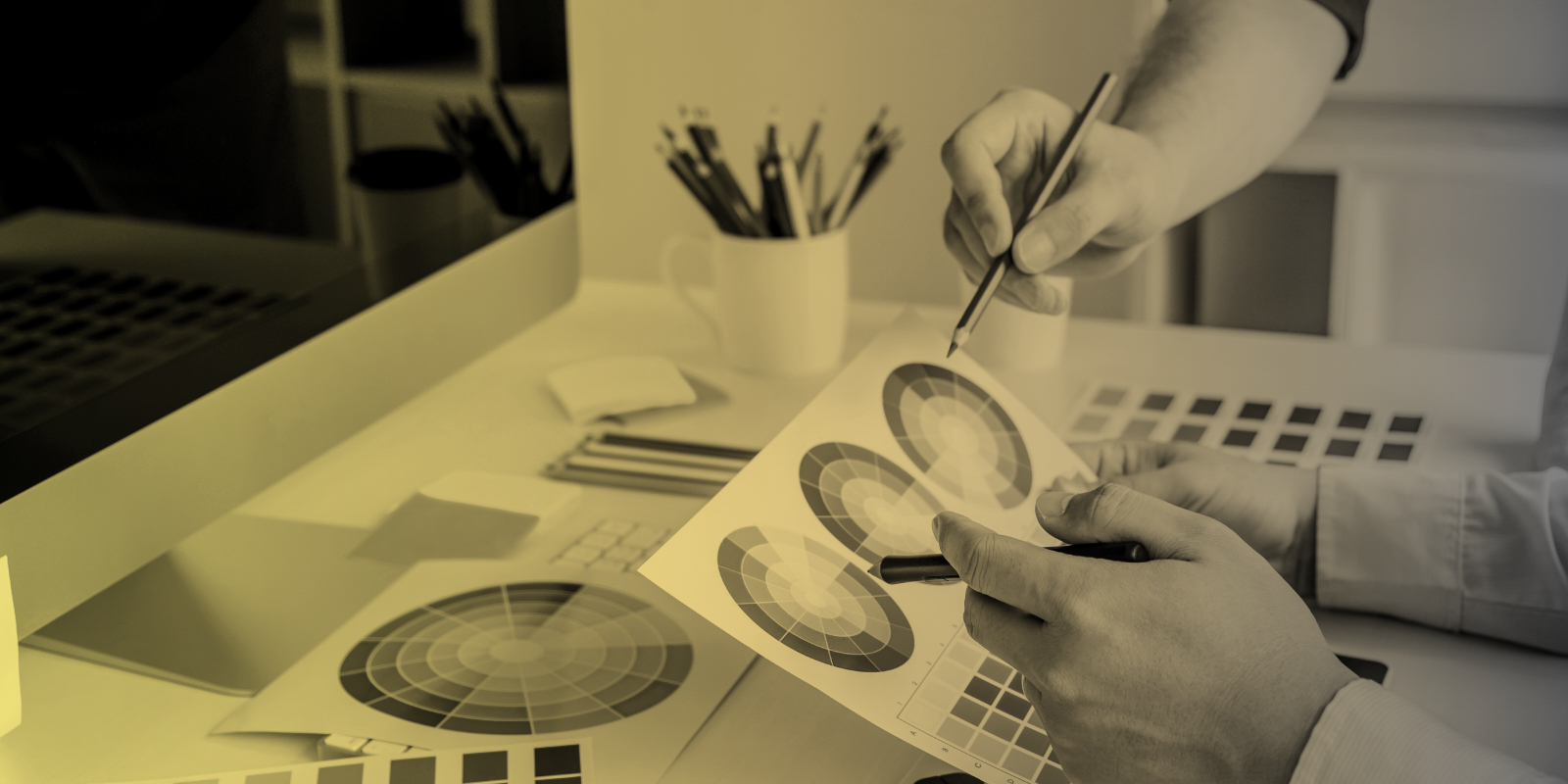 Close up image of graphic designers choosing colors