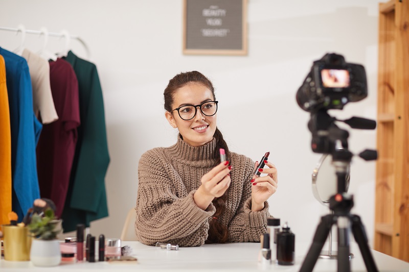 Young Woman Filming Beauty Tutorial Video
